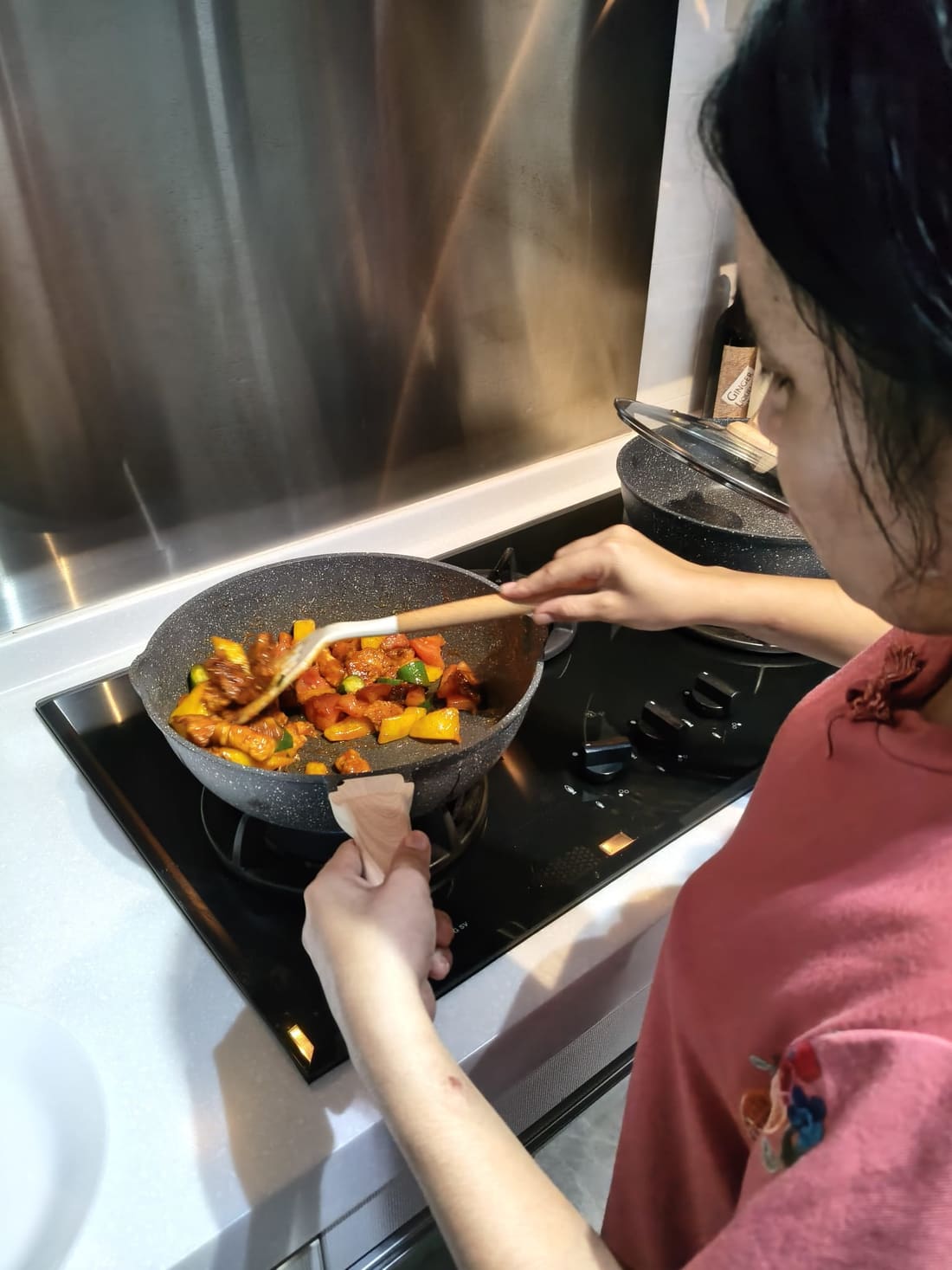 Helper cooking a family meal