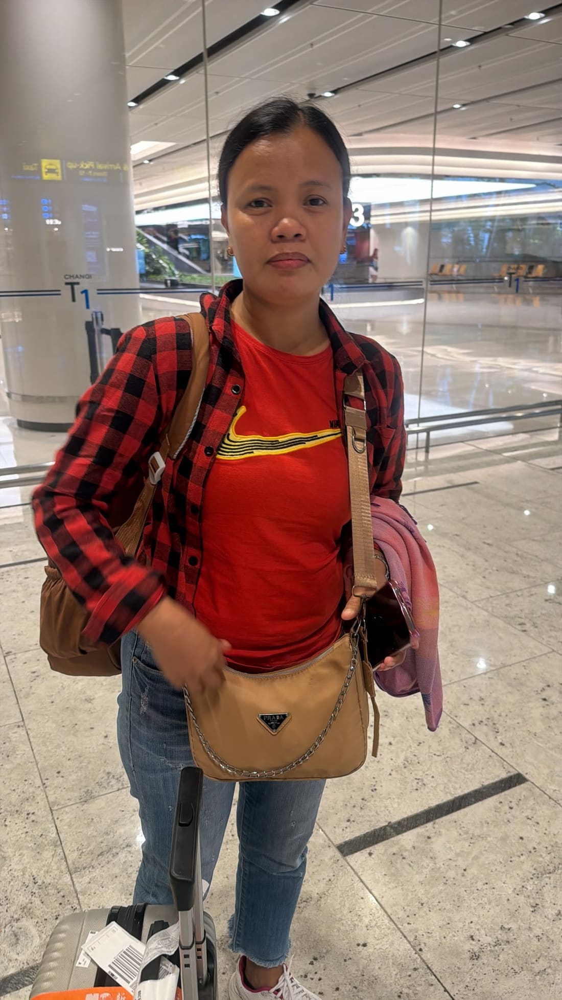 An experienced Apex Maids helper photographed on her travel day