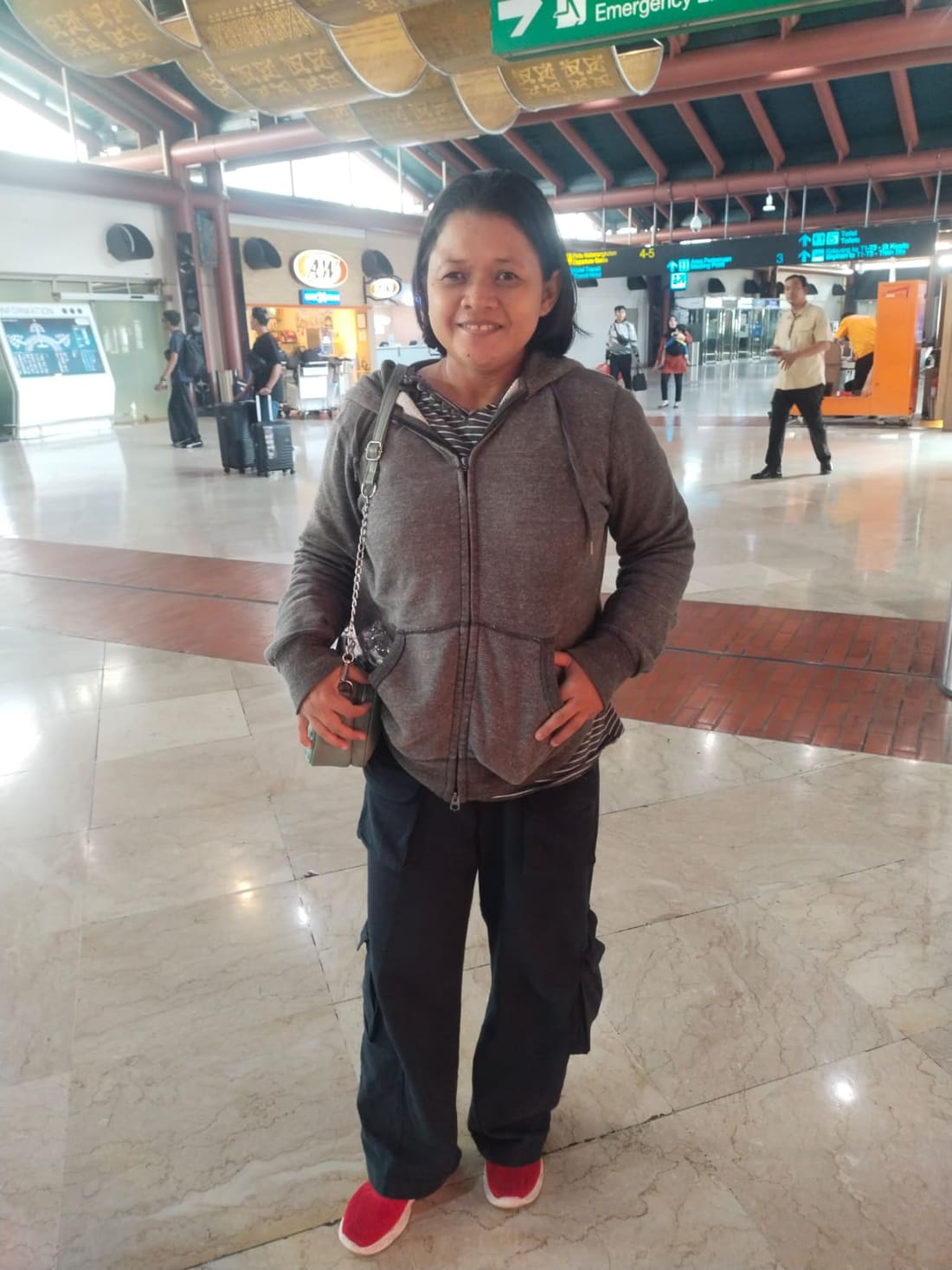 An Apex Maids helper photographed on her travel day